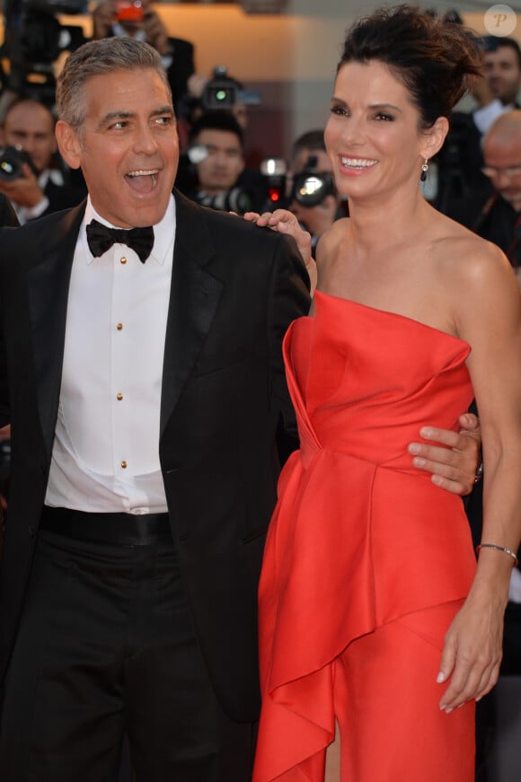 George Clooney, Sandra Bullock lors de la cérémonie d'ouverture de la Mostra de Venise avec la présentation du film "Gravity" le 28 août 2013