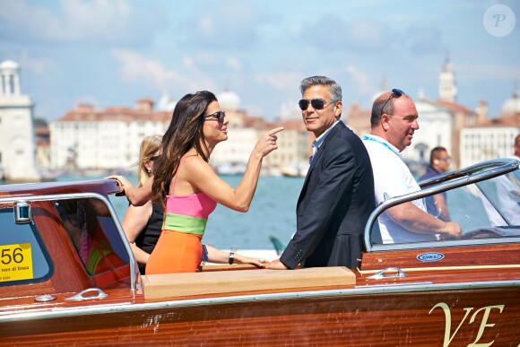 George Clooney et Sandra Bullock sur les taxi-bateaux à Venise le 28 août 2013