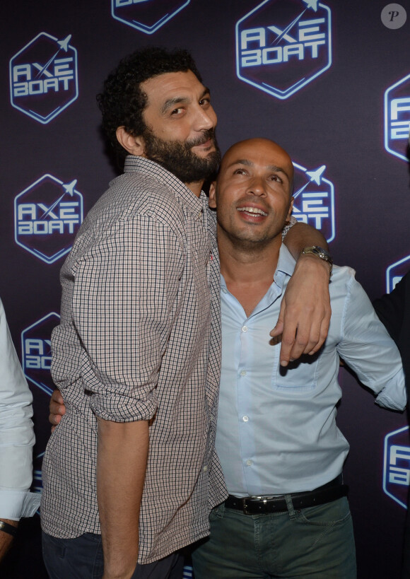 Eric Judor et Ramzy Bedia - Soirée Axe Boat. Palais des Festivals dans le port de Cannes, le 3 août 2013.