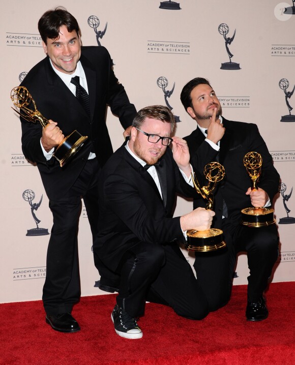 Josh Earl, Rob Butler et Alex Durham récompensés pour le montage de l'émission "Deadliest Catch" lors des Creative Arts Emmy Awards à Los Angeles, le 15 septembre 2013.