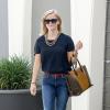 Reese Witherspoon ne quitte plus son sac W