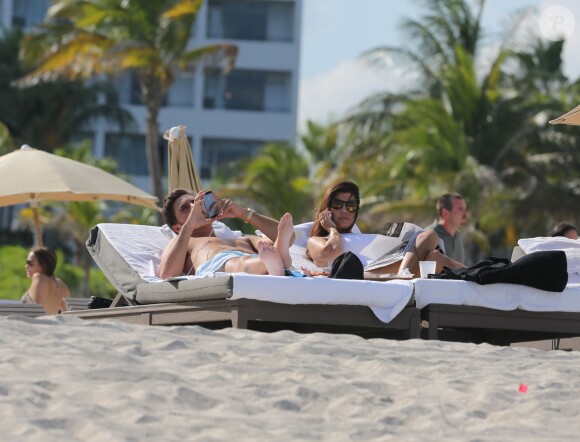 Kourtney Kardashian et son petit ami Scott Disick à Miami le samedi 28 septembre 2013 à Paris.