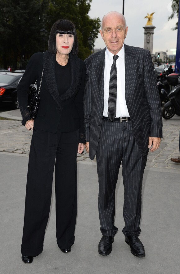 La créatrice de lingerie Chantal Thomass et son mari Michel Fabian arrivent à la galerie sud est du Grand Palais pour assister au défilé Akris printemps-été 2014. Paris, le 29 septembre 2013.