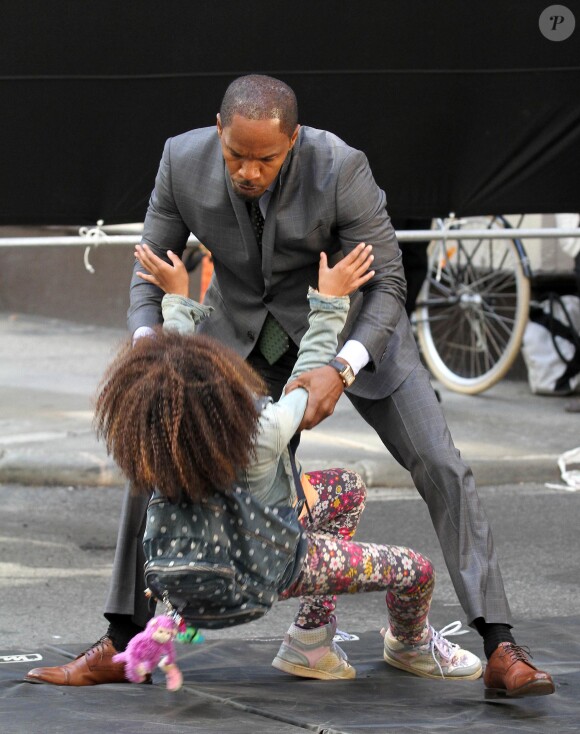 Quvenzhane Wallis et Jamie Foxx sur le tournage d'Annie à TriBeCa, New York le 25 septembre 2013.
