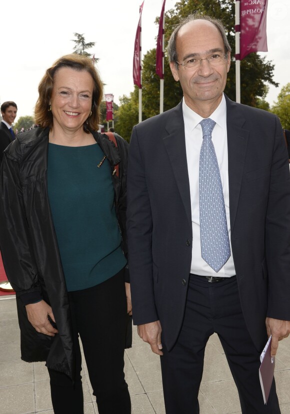 Eric Woerth avec sa femme Florence au 92e Qatar Prix de l'Arc de Triomphe sur l'hippodrome de Longchamp à Paris le 6 octobre 2013.