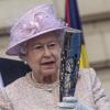 Queen Elizabeth II stands in front of Commonwealth country flags during the launch ceremony of the Queen's Baton at Buckingham Palace in London, UK on October 9, 2013. Photo by Richard Pohle/The Times/PA Wire/ABACAPRESS.COM09/10/2013 - London