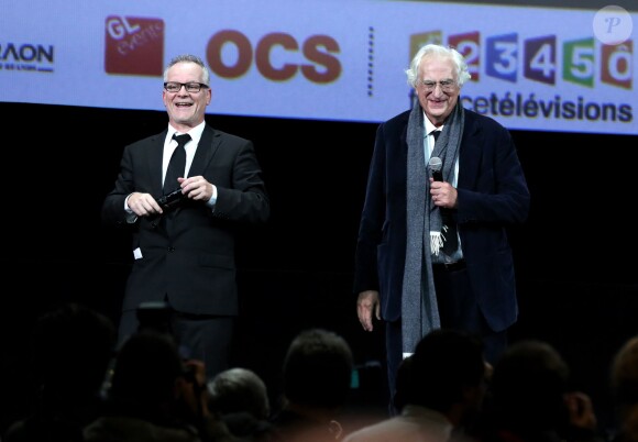 Thierry Frémaux et Bertrand Tavernier lors de la soirée d'ouverture du Festival Lumière à Lyon et l'hommage à Jean-Paul Belmondo au sein de la Halle Tony Garnier, le 14 octobre 2013