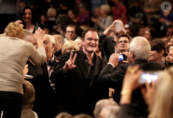 Quentin Tarantino lors de la soirée d'ouverture du Festival Lumière à Lyon et l'hommage à Jean-Paul Belmondo au sein de la Halle Tony Garnier, le 14 octobre 2013