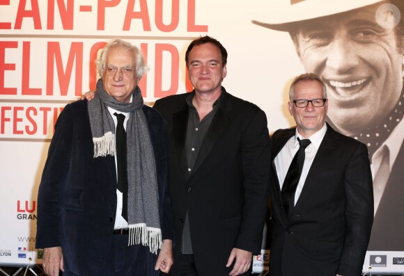 Bertrand tavernier, Quentin Tarantino et Thierry Frémaux lors de la soirée d'ouverture du Festival Lumière à Lyon et l'hommage à Jean-Paul Belmondo au sein de la Halle Tony Garnier, le 14 octobre 2013