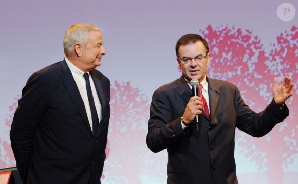 Christian Courtin (PDG de Clarins) et son frère Olivier - Remise du 16e Prix Clarins de la Femme Dynamisante au Théâtre Mogador à Paris, le 14 otobre 2013.
