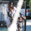 Sandra Bullock et son fils Louis deguises se rendent a une fete d' Halloween Los Angeles, le 19 octobre 2013  Please hide childreen's face prior to the publication 51238206 'Gravity' star Sandra Bullock looks amazing in full costume as she takes her son Louis to a Halloween party at his school in Sherman Oaks, California on October 19, 2013. The fun-loving actress went all out in face paint and an elaborate costume to match with her son's skeleton outfit. 'Gravity' star Sandra Bullock looks amazing in full costume as she takes her son Louis to a Halloween party at his school in Sherman Oaks, California on October 19, 2013. The fun-loving actress went all out in face paint and an elaborate costume to match her son's skeleton outfit.19/10/2013 - Los Angeles
