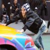 Cara Delevingne donne toute son energie lors d'un shooting photo pour DKNY à New York le 15/10/2013