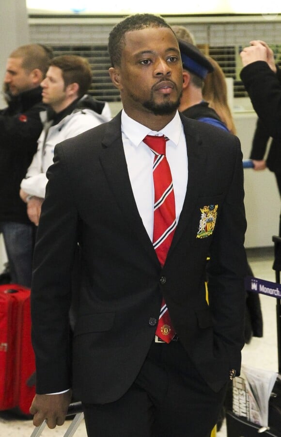 Patrice Evra arrive à l'aéroport de Manchester le 12 février 2013