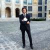 Christophe Ono-dit-Biot pose avec son livre "Plonger"qui vient de lui valoir Grand prix du roman de l'Académie française à Paris, le 24 Octobre 2013.