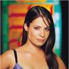 Holly Marie Combs alias Piper dans Charmed