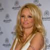 Pamela Anderson présente une collection de vernis de la marque "Striplac" à Dusseldorf, le 15 mars 2013.
