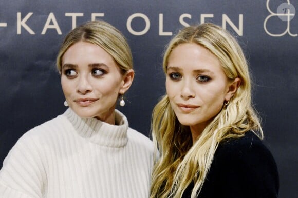 Les jumelles Mary-Kate et Ashley Olsen font le lancement de leur nouvelle collection pour la marque Bik Bok à Stockholm, le 8 août 2013.