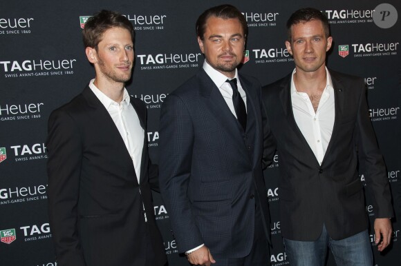 Leonardo DiCaprio au côté de Romain Grosjean et Sébastien Ogier lors de la soirée TAG Heuer qui célébrait le 50e anniversaire de son modèle emblématique, la Carrera, au Pavillon Vendôme à Paris, le 6 novembre 2013