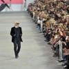 Karl Lagerfeld lors du défilé Chanel printemps-été 2014 à Paris, le 1er octobre 2013.