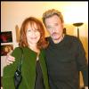 Johnny Hallyday et Nathalie Baye en mai 2009 lors d'un concert.