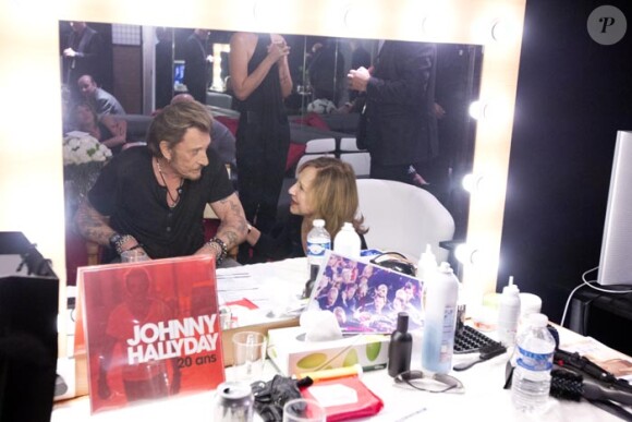 Exclu : Johnny Hallyday et Nathalie Baye dans la loge du POB de Bercy après le concert du 15 juin 2013.