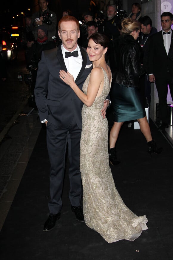 Helen McCrory et Damian Lewis radieux lors des 59e Evening Standard Theatre Awards à Londres le 17 novembre 2013.