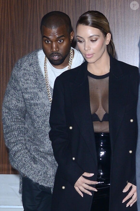 Kanye West et Kim Kardashian, sexy en top transparent, se rendent au Barclays Center à New York. Le 19 novembre 2013.