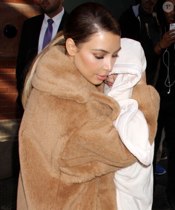 Kim Kardashian et sa fille North dans le quartier de SoHo. New York, le 19 novembre 2013.