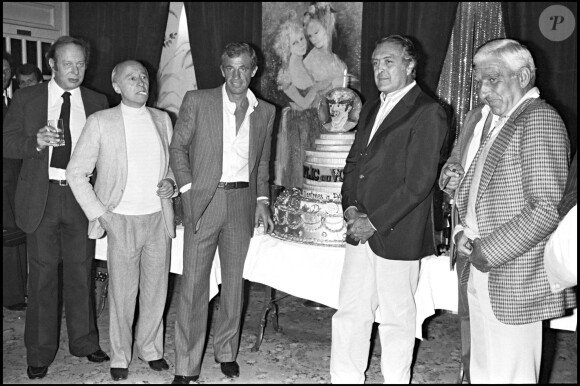 Jean-Paul Belmondo avec Michel Audiard et Georges Belmondo, en 1979 à Cannes.