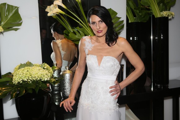 Exclusif - Sylvie Ortega Munos, femme de Ludovic Chancel au défilé de la maison de couture Anahid Sinsek, le 28 novembre 2013 à l'hôtel Renaissance Paris Arc de Triomphe.