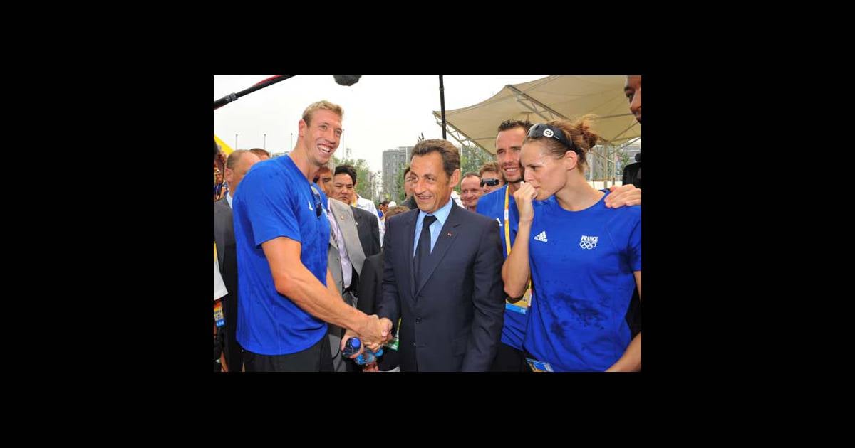 Nicolas Sarkozy, Laure Manaudou et Alain Bernard - Purepeople