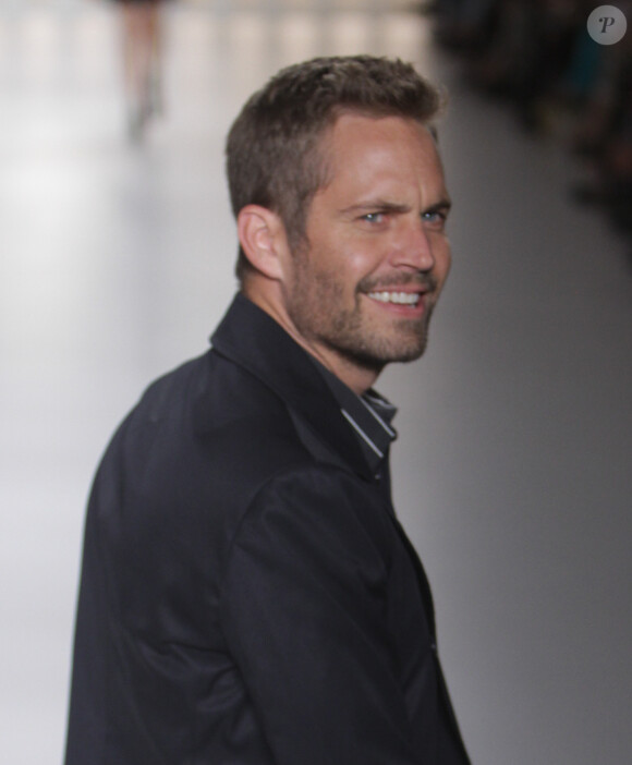 Paul Walker défile sur le podium "Colcci" à Sao Paulo, au Brésil, le 21 mars 2013