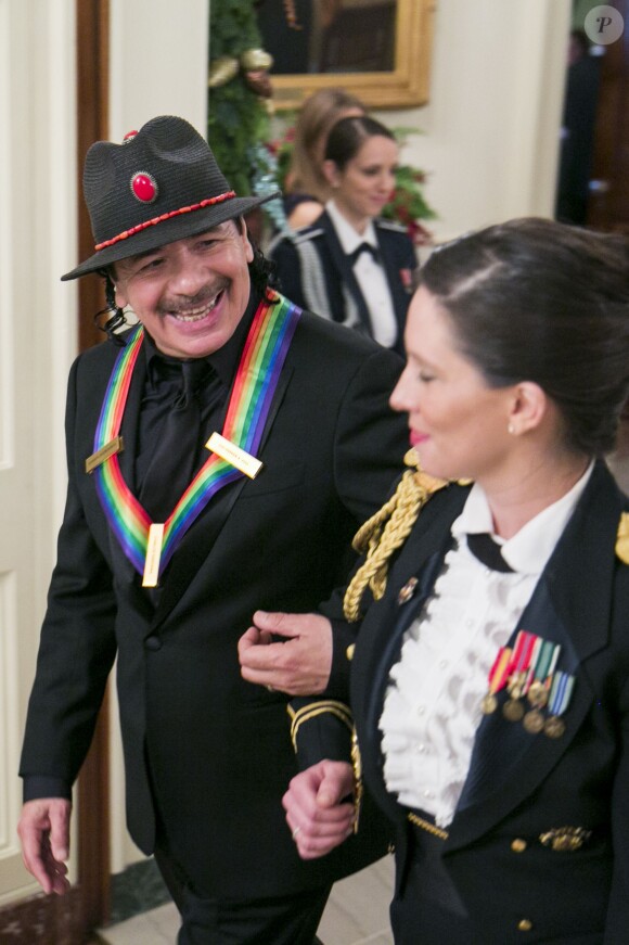 Carlos Santana récompensé lors des 36e Honneurs du Kennedy Center à la Maison Blanche le 8 décembre 2013.