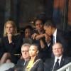 Helle Thorning-Schmidt séparée de Barack Obama par Michelle Obama Lors de la cérémonie d'hommage à Nelson Mandela au stade de Soccer City à Soweto, le 10 décembre 2013.