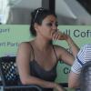 Exclusif - Mila Kunis (enceinte ?) fait du shopping avec son père Mark et des amis à Tampa Bay, le 7 décembre 2013.