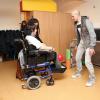 Christophe Jallet visite le service d'aide aux personnes handicapées à la Maison de Marie à Poissy, le 12 décembre 2013 pour la Fondation Paris Saint-Germain.