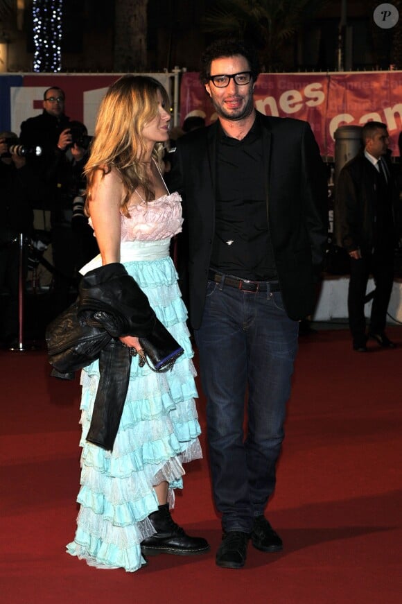 Manu Lévy et sa compagne - 15e édition des NRJ Music Awards au Palais des Festivals à Cannes le 14 décembre 2013.