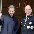 La princesse Charlene et le prince Albert II de Monaco lors de la fête nationale en principauté le 19 novembre 2013