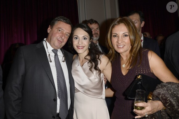 Exclusif - Candice Hugo entourée de Daniel et Monica Legrand lors de la soirée de son mariage avec Christophe Dardeau au sein de l'hôtel de Sers Paris le 18 décembre 2013
