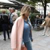 Kim Kardashian à Paris en octobre 2013 ose le total look jean et booste sa tenue avec un manteau Céline. La star de real tv a revu sa garde-robe depuis qu'elle est maman de North (née en juin 2013) et nous épate à chaque sortie.