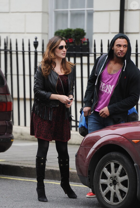 Kelly Brook sort de chez elle avec son nouveau petit ami David McIntosh à Londres, le 5 janvier 2014.