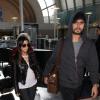 Kourtney Kardashian et Scott Disick arrivent a l'aeroport de Los Angeles en provenance de Tucson, le 3 decembre 2013.