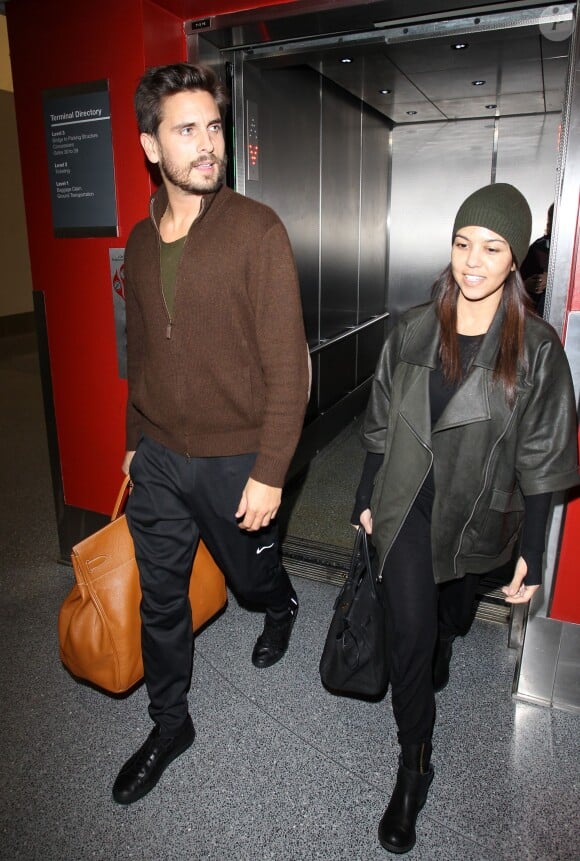 Kourtney Kardashian et Scott Disick arrivent LAX, le 24 novembre 2013