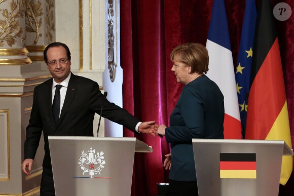 François Hollande et Angela Merkel à Paris, le 18 décembre 2013.