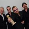 Bono, The Edge, Adam Clayton, Larry Mullen, Jr., Brian Burton en press room avec leur Golden Globe Award, Beverly Hilton, Los Angeles, le 12 janvier 2014.
