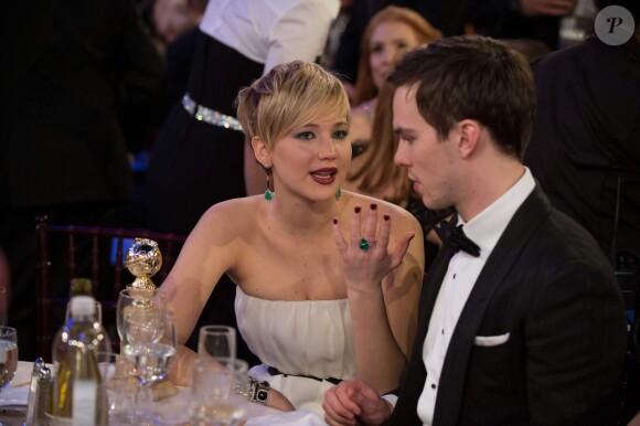 Jennifer Lawrence avec son boyfriend pendant le dîner des Golden Globe Awards au Beverly Hilton, Beverly Hills, Los Angeles, le 12 janvier 2014.