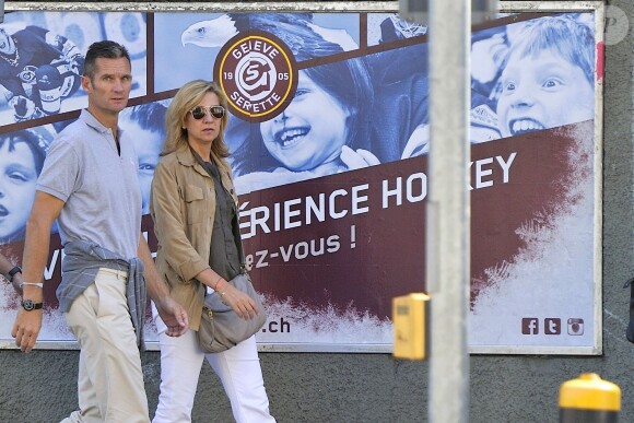 Cristina d'Espagne et son mari Iñaki Urdangarin, mis en examen dans le scandale Noos, le 3 septembre 2013 à Genève, en Suisse.