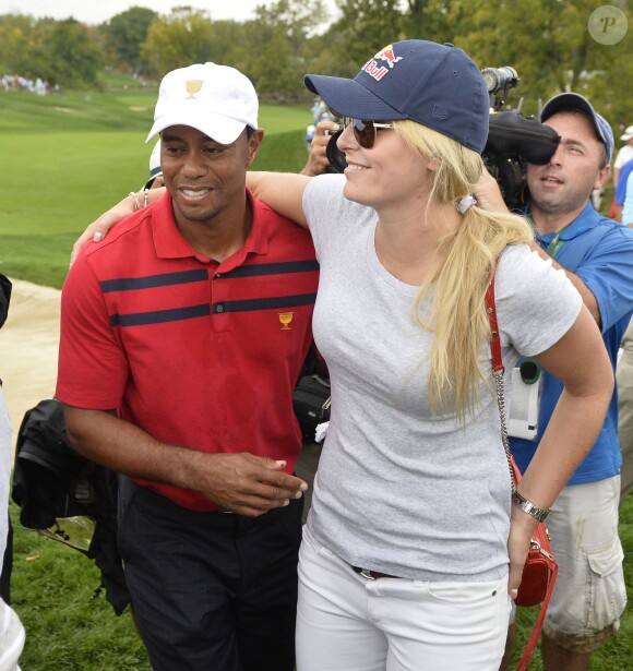 Tiger Woods et Lindsey Vonn lors de la Presidents Cup au Muirfield Village Golf Club de Dublin, le 5 octobre 2013 aux Etats-Unis