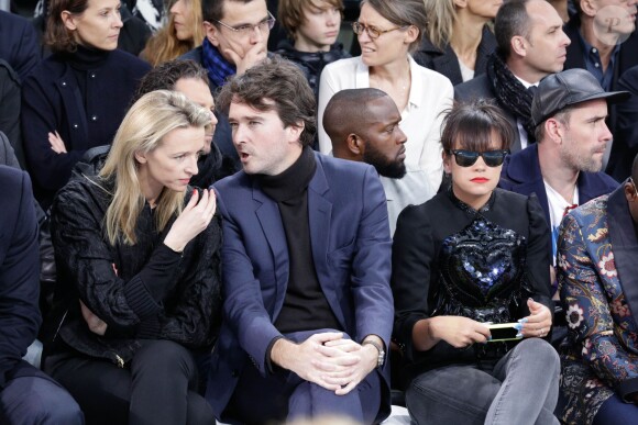 Delphine Arnault, Antoine Arnault et Lily Allen lors du défilé homme Louis Vuitton automne-hiver 2014-2015. Paris, le 16 janvier 2014.