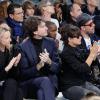 Delphine Arnault, Antoine Arnault, Lily Allen et Tinie Tempah lors du final du défilé homme Louis Vuitton automne-hiver 2014-2015. Paris, le 16 janvier 2014.
